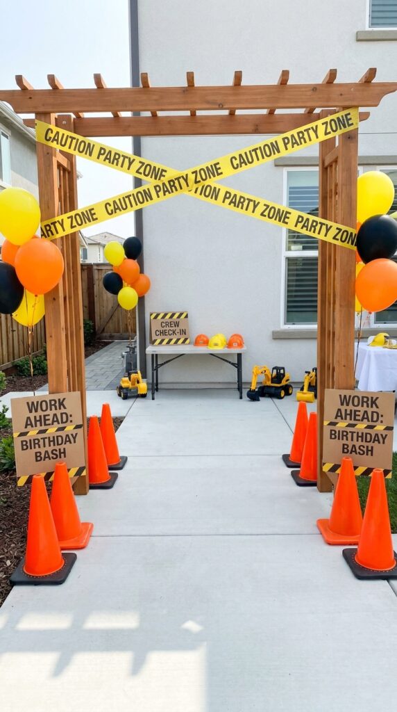 Construction zone themed birthday party entrance setup