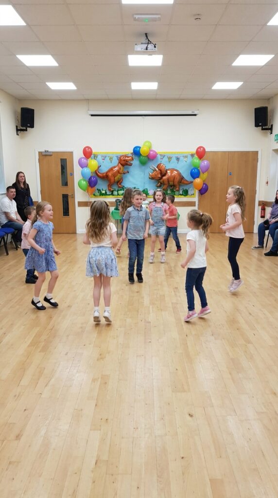 Kids dancing at a dinosaur-themed party
