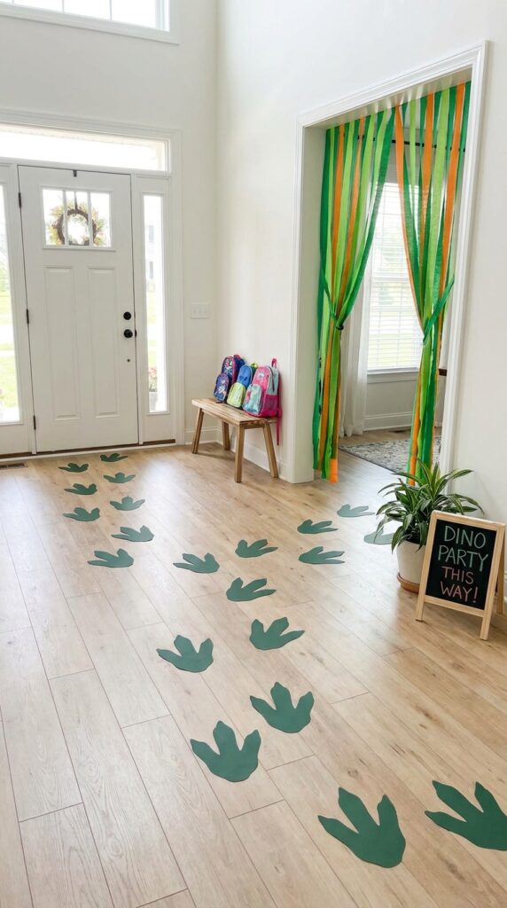Dinosaur footprint path leading to party setup