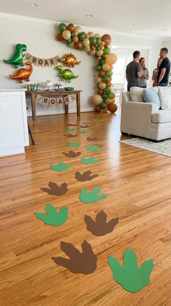 Dinosaur footprint path leading kids through party activities