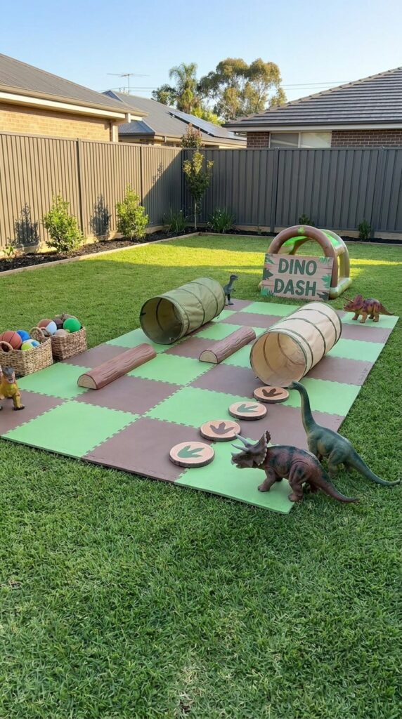 Kids playing in a dinosaur themed obstacle course with tunnels and decorations