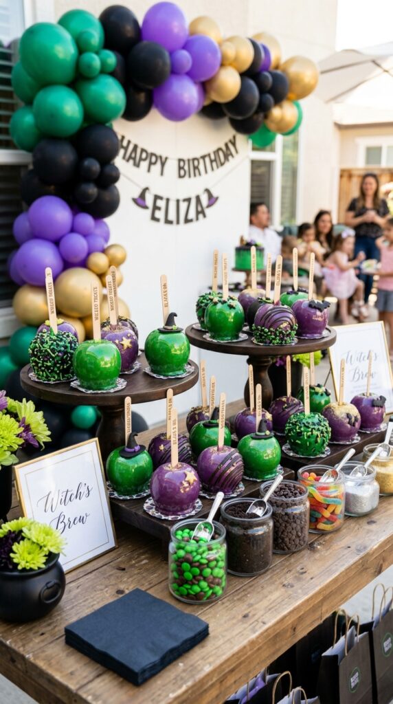 Wicked birthday candy apple station with colorful themed treats