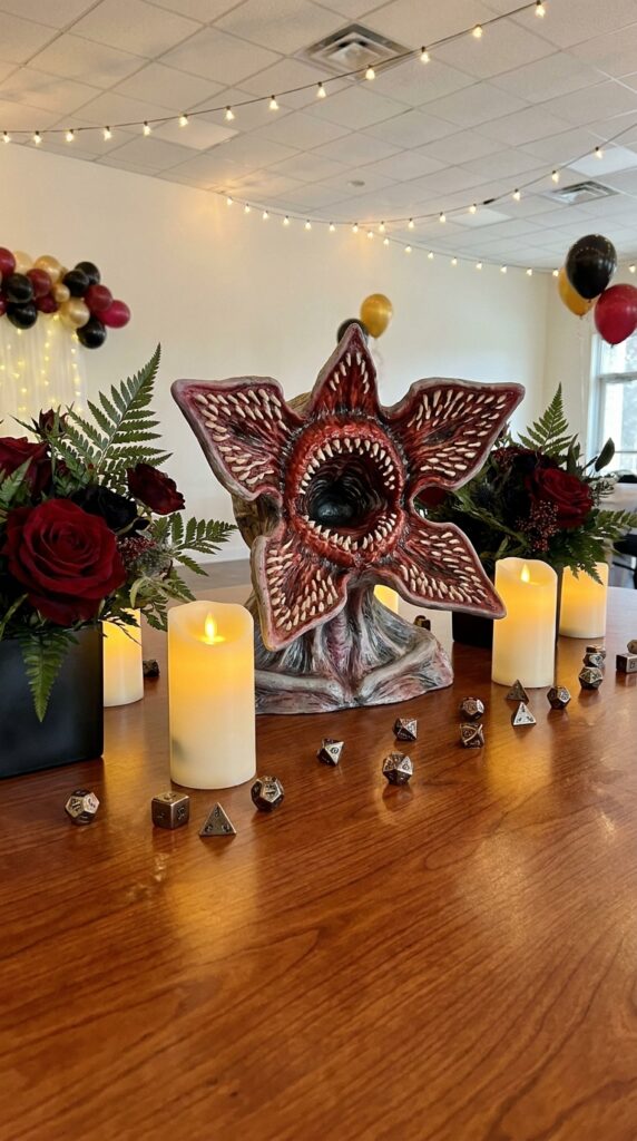 Demogorgon head model centerpiece on Stranger Things themed party table