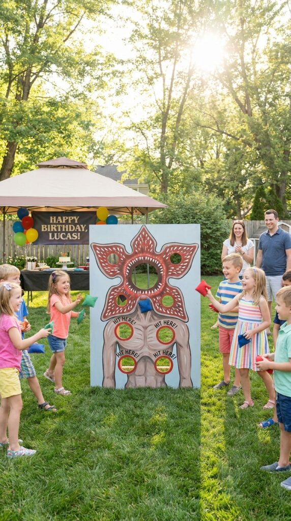 Demogorgon target game setup with kids throwing balls at themed board