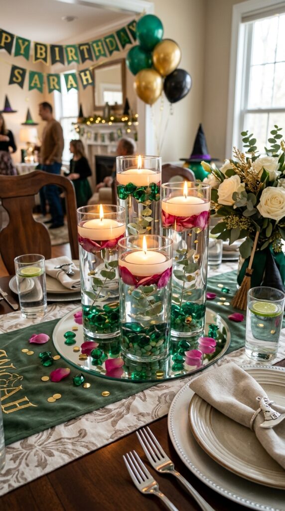 Floating candle centerpiece with emerald accents for a Wicked birthday party.