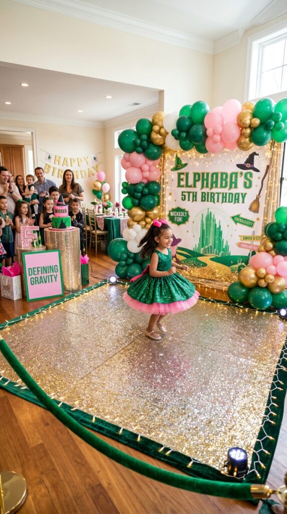 Glittery dance floor corner at a Wicked-inspired 5th birthday celebration.