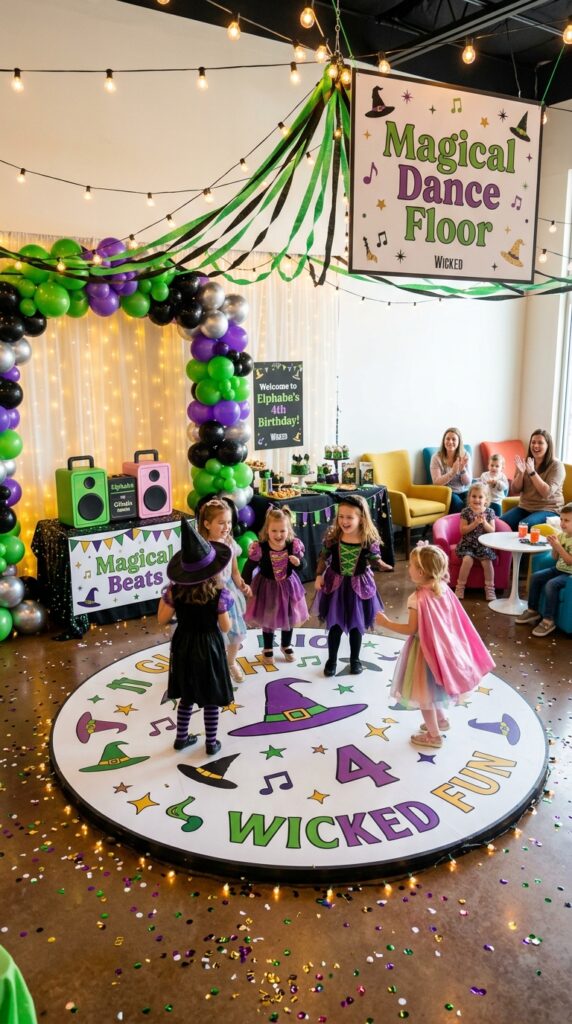 Colorful dance floor setup for a Wicked-themed 4th birthday celebration.
