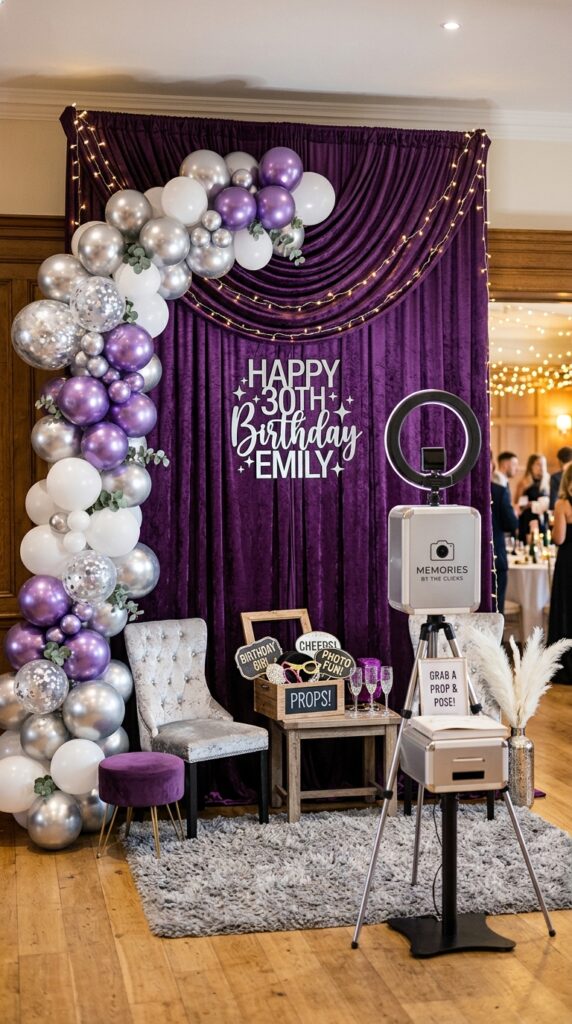 Highly realistic purple velvet birthday backdrop with silver balloons, fairy lights, elegant photo booth setup, soft luxurious textures, bright indoor lighting.