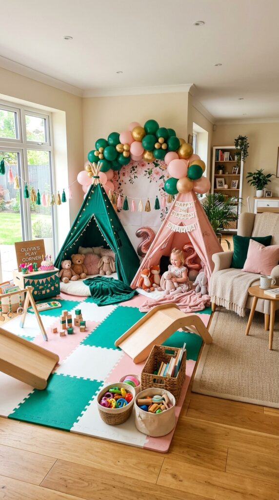 Toddler play zone with Wicked-themed pink and green party decorations.
