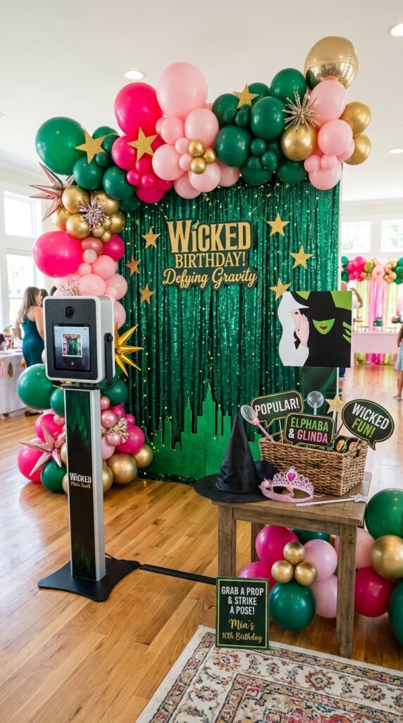 Wicked-inspired birthday photo booth with magical party props and decorations.